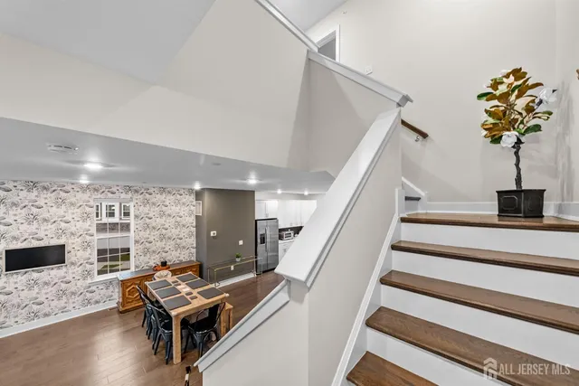 a bedroom with bed and a couch