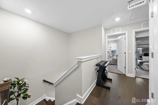 a bedroom with a bed and couch