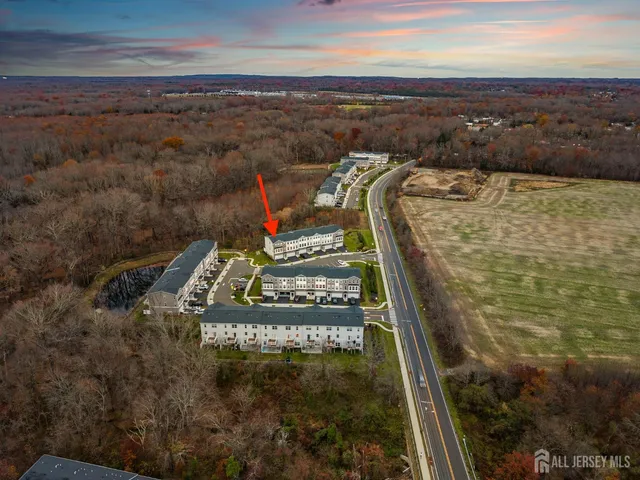 a view of a house with backyard