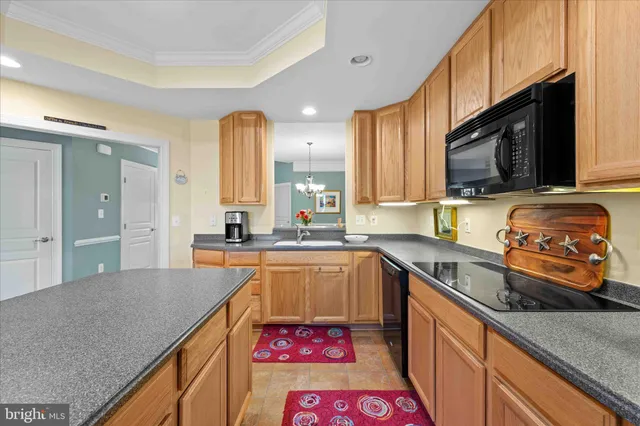 a bedroom with furniture and a flat screen tv