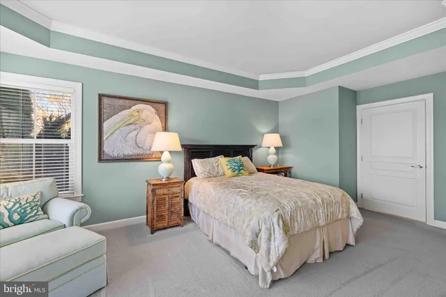 a bathroom with a sink a faucet a potted plant and a mirror