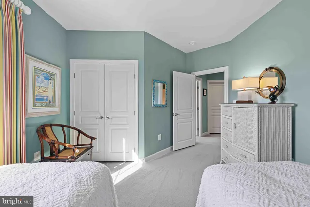 a dining space with furniture and wooden floor