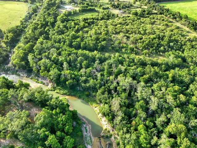 a picture of a bathroom with a shower
