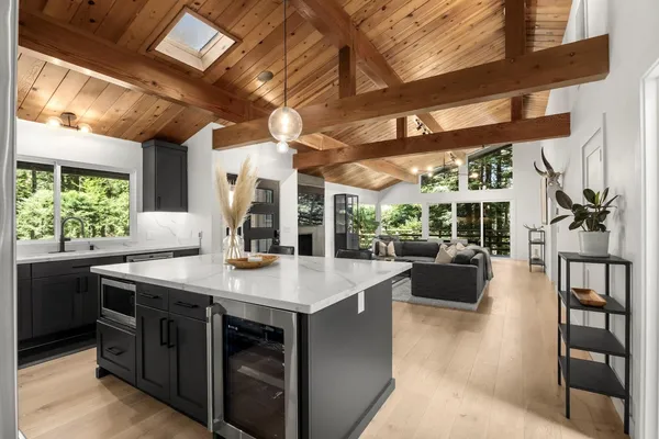 a view of kitchen with living room