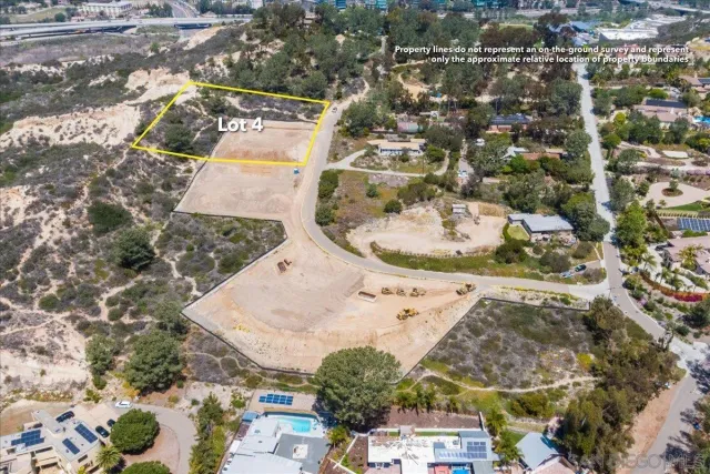 an aerial view of a house with a outdoor space