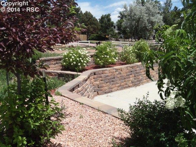 5003 Rocking R Drive Colorado Springs, CO 80915 - Photo 4 of 22 Front landscaping and part of the driveway.