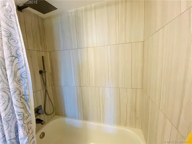 a kitchen with granite countertop a stove and a sink