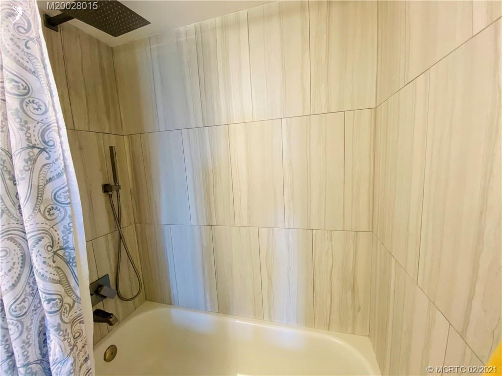 7440 South Ocean Drive, Unit 524A Jensen Beach, FL 34957 - Photo 12 of 64 a bathroom with a sink