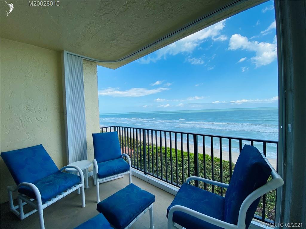 7440 South Ocean Drive, Unit 524A Jensen Beach, FL 34957 - Photo 31 of 64 a balcony with furniture