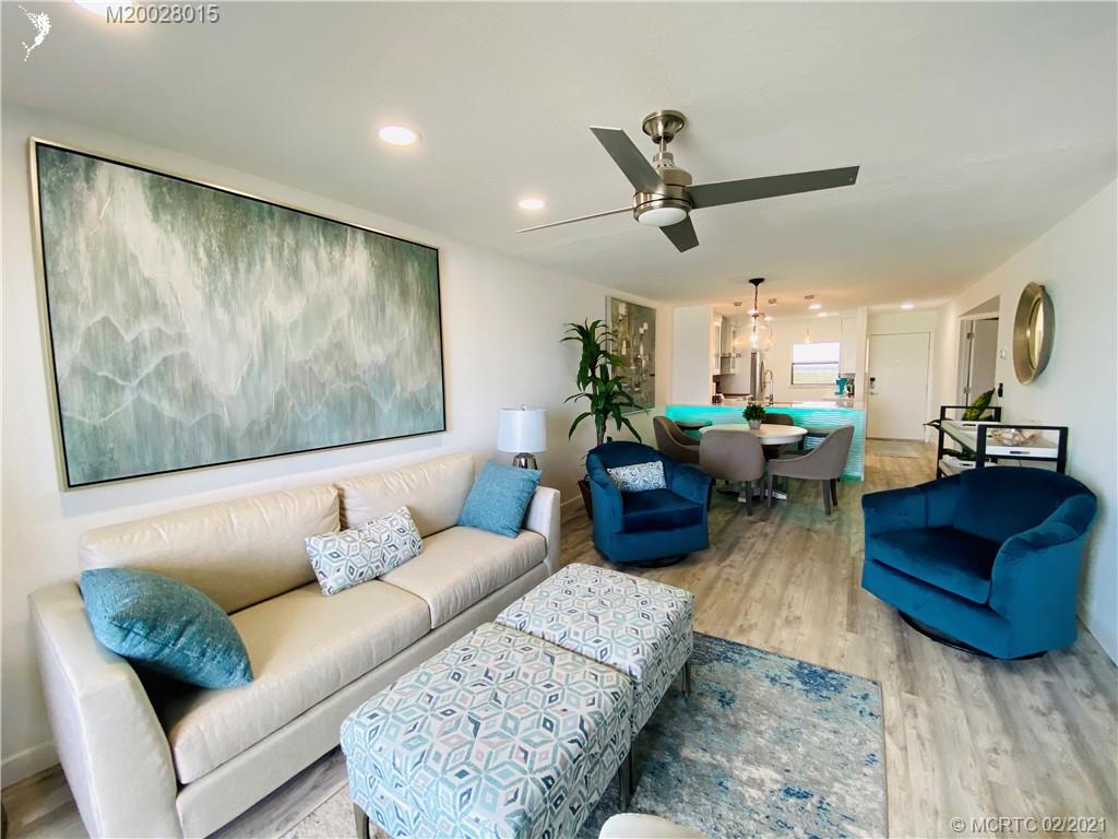 7440 South Ocean Drive, Unit 524A Jensen Beach, FL 34957 - Photo 36 of 64 a living room with furniture and wooden floor