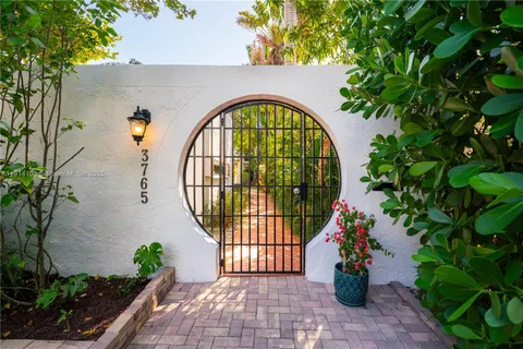 a view of entryway with flower pots