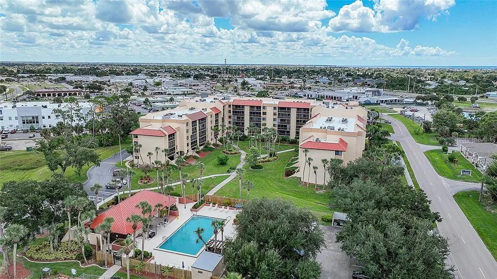 3006 Caring Way, Unit 329 Port Charlotte, FL 33952 - Photo 20 of 37 an aerial view of a house with a garden