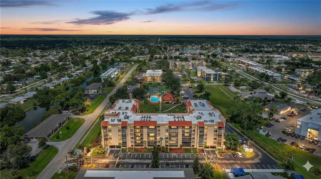 3006 Caring Way, Unit 329 Port Charlotte, FL 33952 - Photo 2 of 37 an aerial view of a city