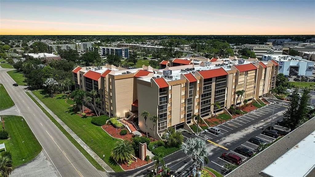3006 Caring Way, Unit 329 Port Charlotte, FL 33952 - Photo 21 of 37 a view of a city with tall buildings