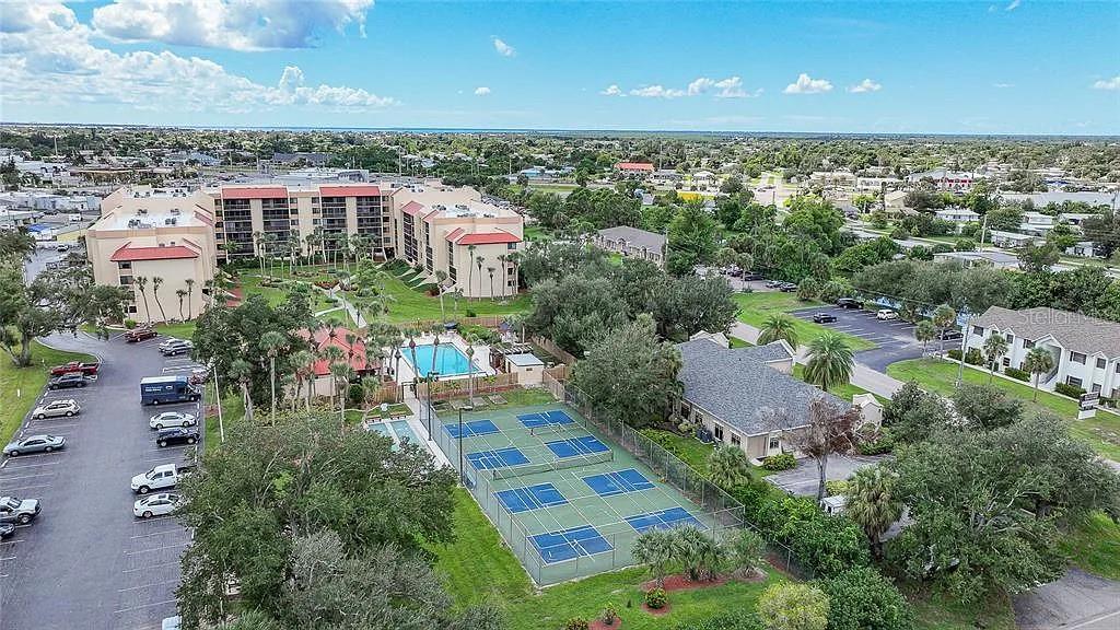 3006 Caring Way, Unit 329 Port Charlotte, FL 33952 - Photo 24 of 37 an aerial view of multiple house
