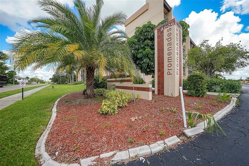 3006 Caring Way, Unit 329 Port Charlotte, FL 33952 - Photo 25 of 37 a sign board with a park