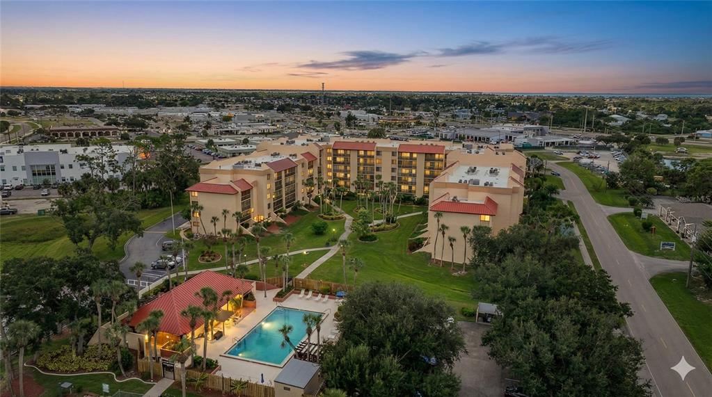 3006 Caring Way, Unit 329 Port Charlotte, FL 33952 - Photo 27 of 37 an aerial view of multiple house