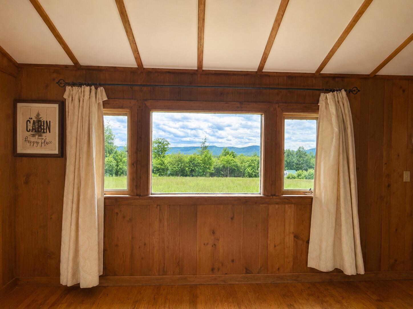715 Great Pond Road Aurora, ME 04408 - Photo 7 of 24 Living Room Window