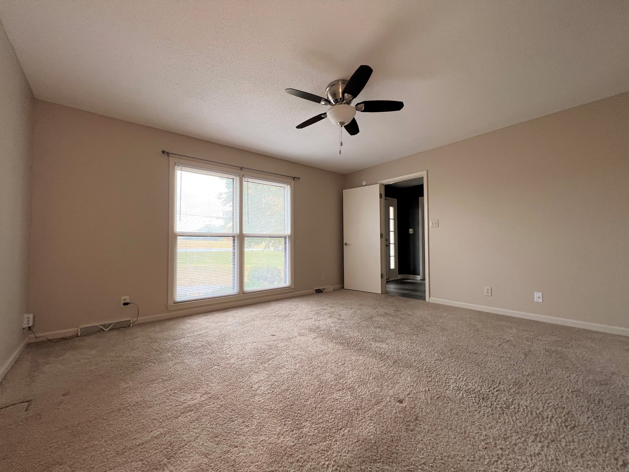 153 Old Farmers Road Clarksville, TN 37043 - Photo 16 of 23 a view of a livingroom with a ceiling fan and window