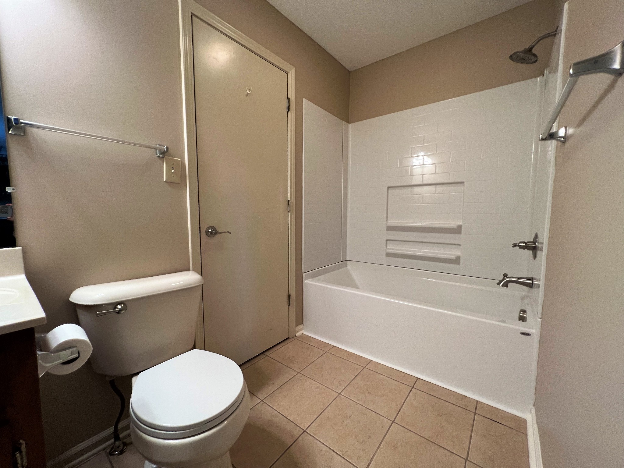 153 Old Farmers Road Clarksville, TN 37043 - Photo 18 of 23 a bathroom with a toilet and a shower