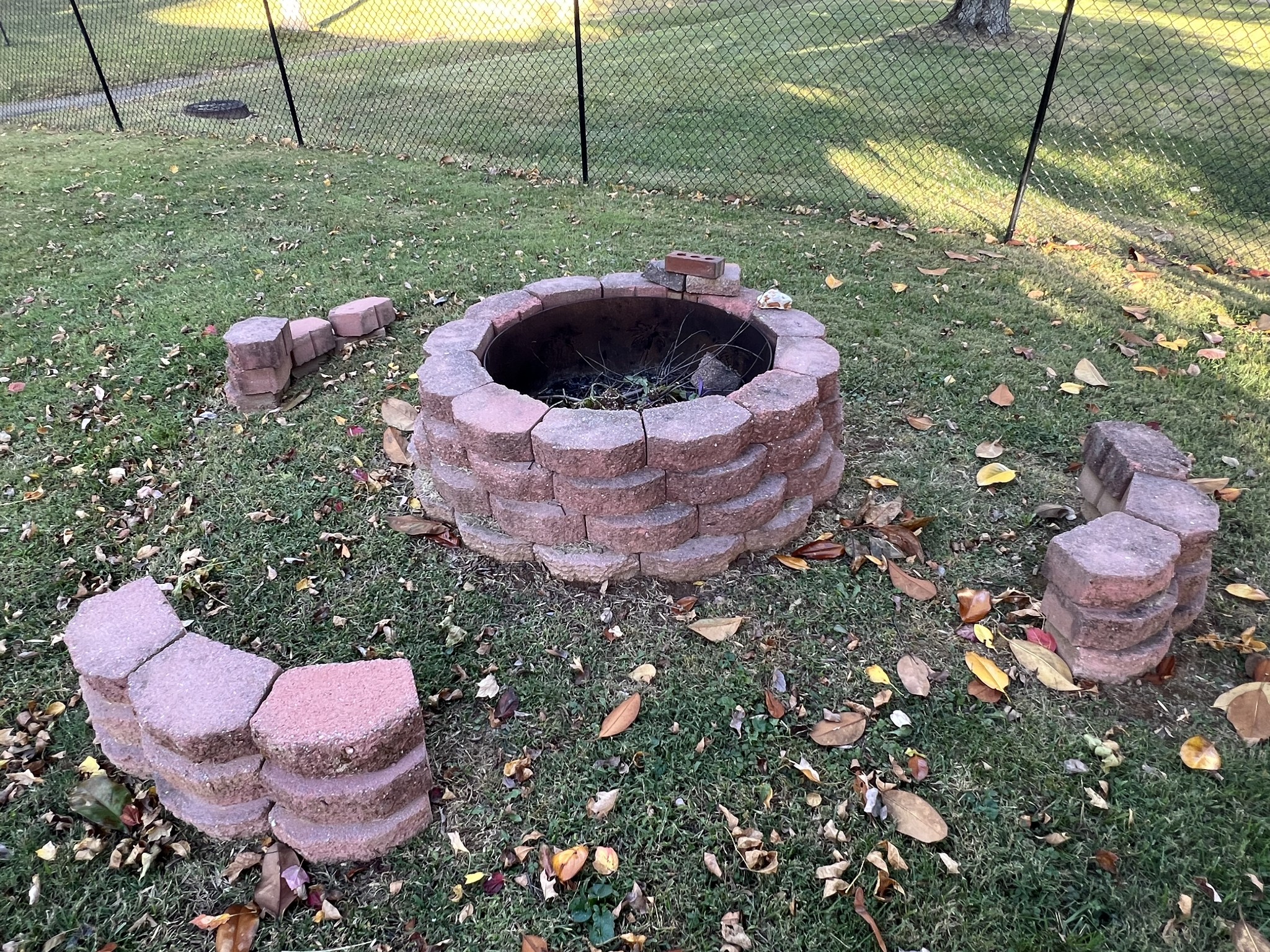 153 Old Farmers Road Clarksville, TN 37043 - Photo 21 of 23 a view of a backyard with table and chairs and fire pit