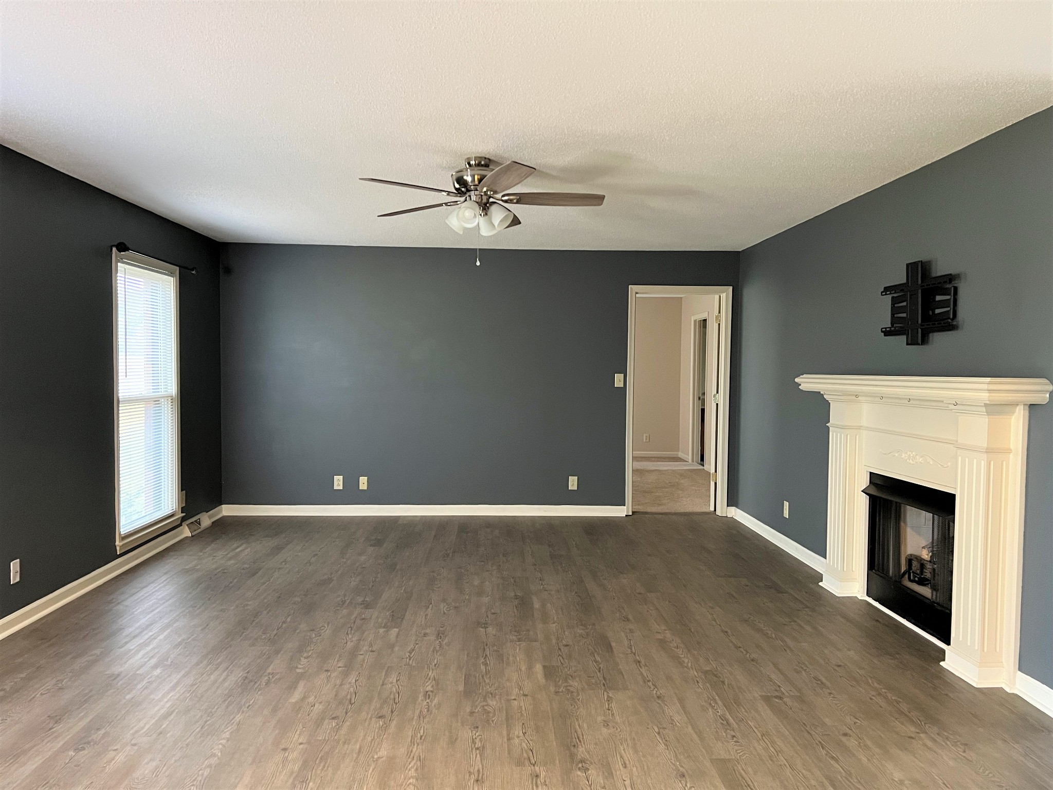 153 Old Farmers Road Clarksville, TN 37043 - Photo 4 of 23 a view of an empty room with window and fireplace