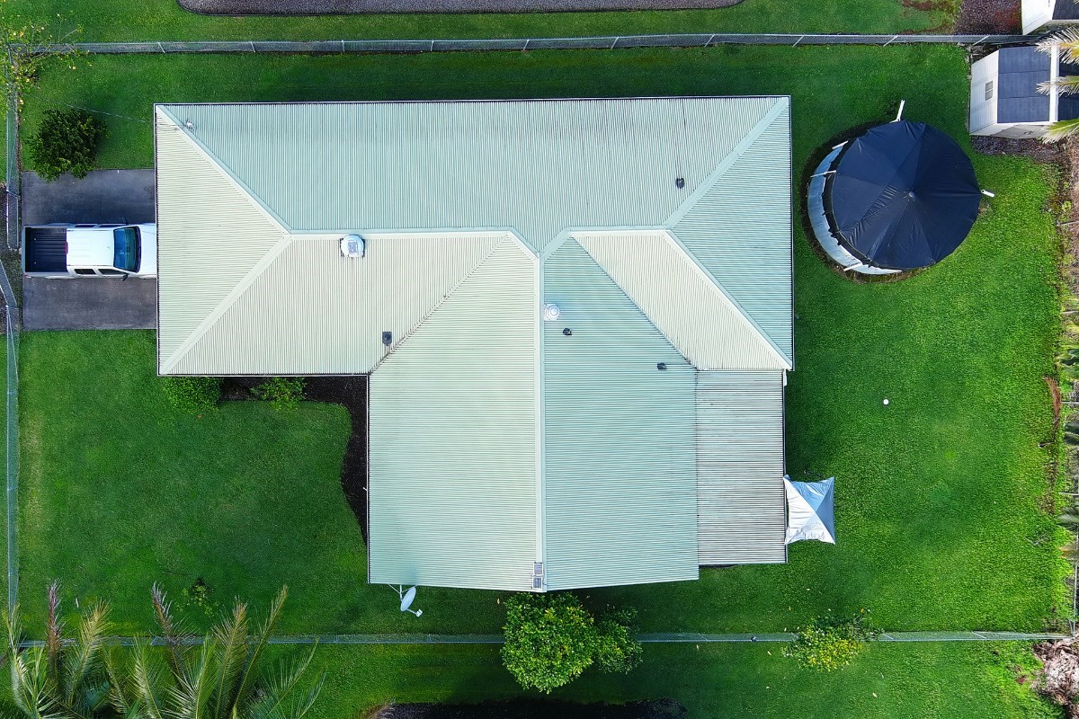 14-521 Hapuu Road Pahoa, HI 96778 - Photo 12 of 13 an aerial view of a house having yard
