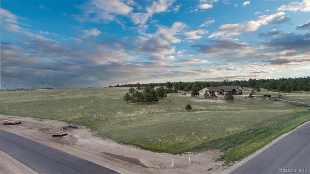 a view of a lake with an outdoor space