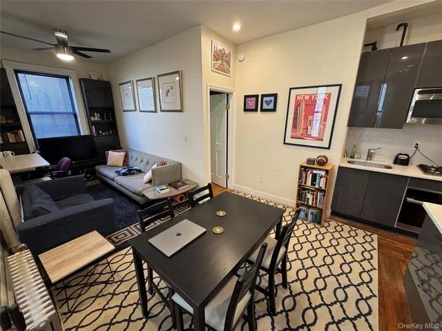 a view of a workspace with furniture