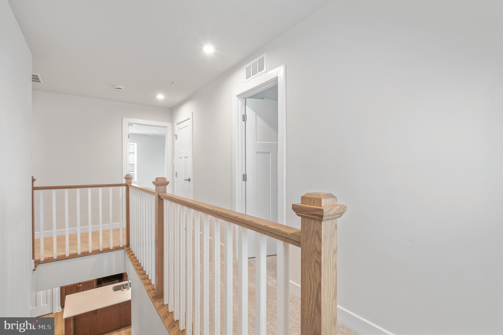 1268 Backbone Way Frederick, MD 21702 - Photo 38 of 92 a view of a hallway with entryway door