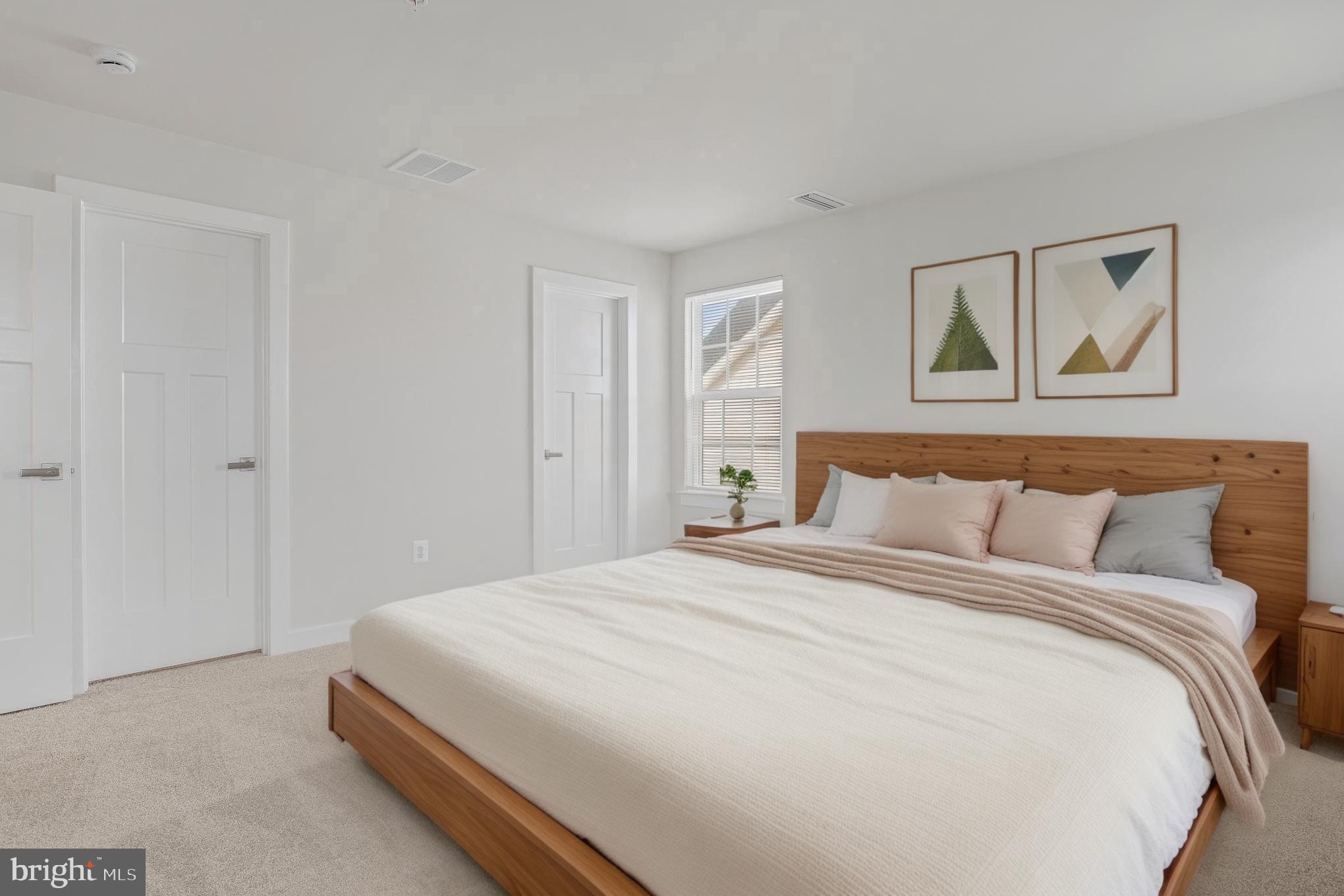 1268 Backbone Way Frederick, MD 21702 - Photo 48 of 92 a bedroom with a bed and painting on the wall