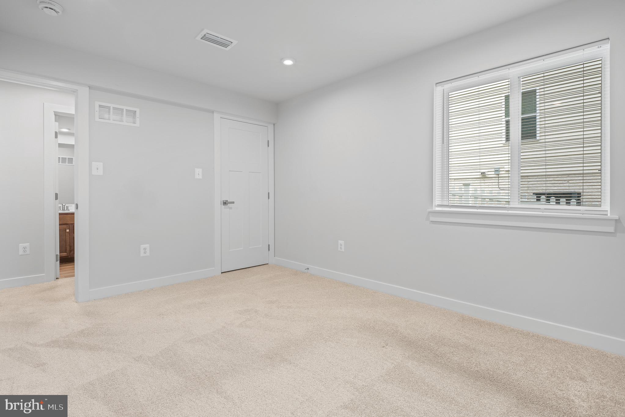 1268 Backbone Way Frederick, MD 21702 - Photo 77 of 92 a view of an empty room with a window