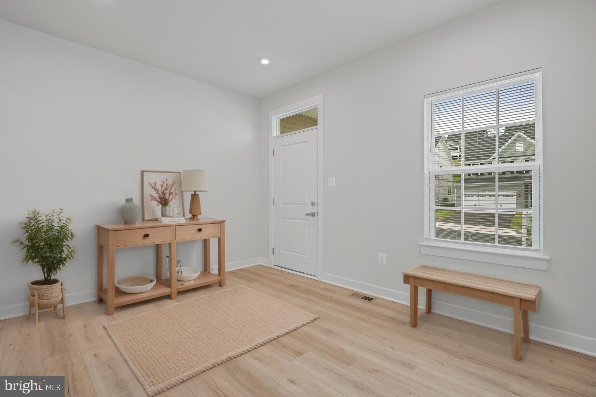 1268 Backbone Way Frederick, MD 21702 - Photo 9 of 92 a room with furniture and a window