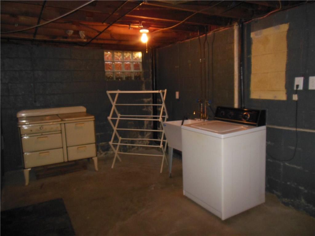 3759 Willett Road Baldwin, PA 15227 - Photo 19 of 25 Laundry Area, Washer Included, New Stationery Tub, Glass Block Windows, Additional Storage Area