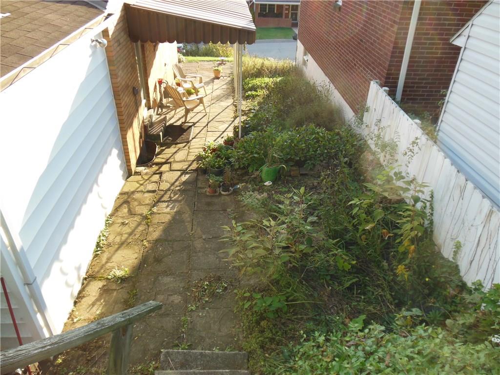 3759 Willett Road Baldwin, PA 15227 - Photo 24 of 25 Scene from Upper Yard to Lower Garden and Patio Space