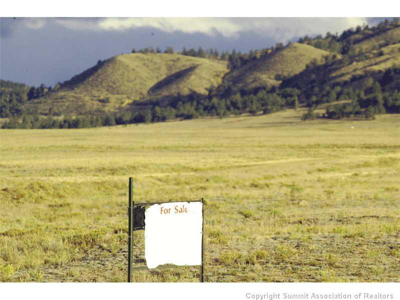 7062 Larimer Road Hartsel, CO 80449 - Photo 1 of 25 a view of an ocean and a mountain