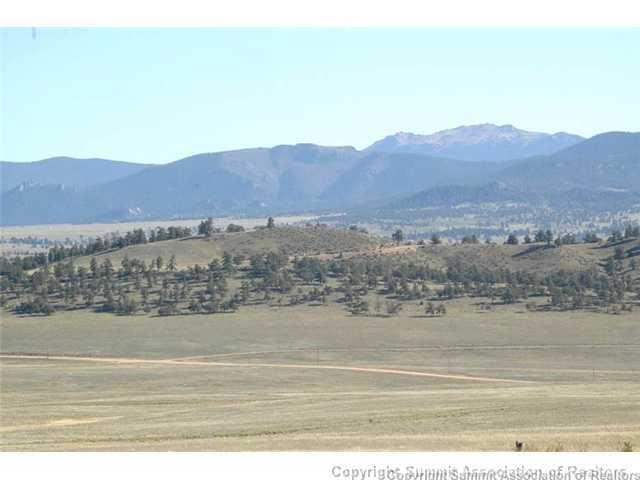 7062 Larimer Road Hartsel, CO 80449 - Photo 19 of 25 a view of lake with mountain