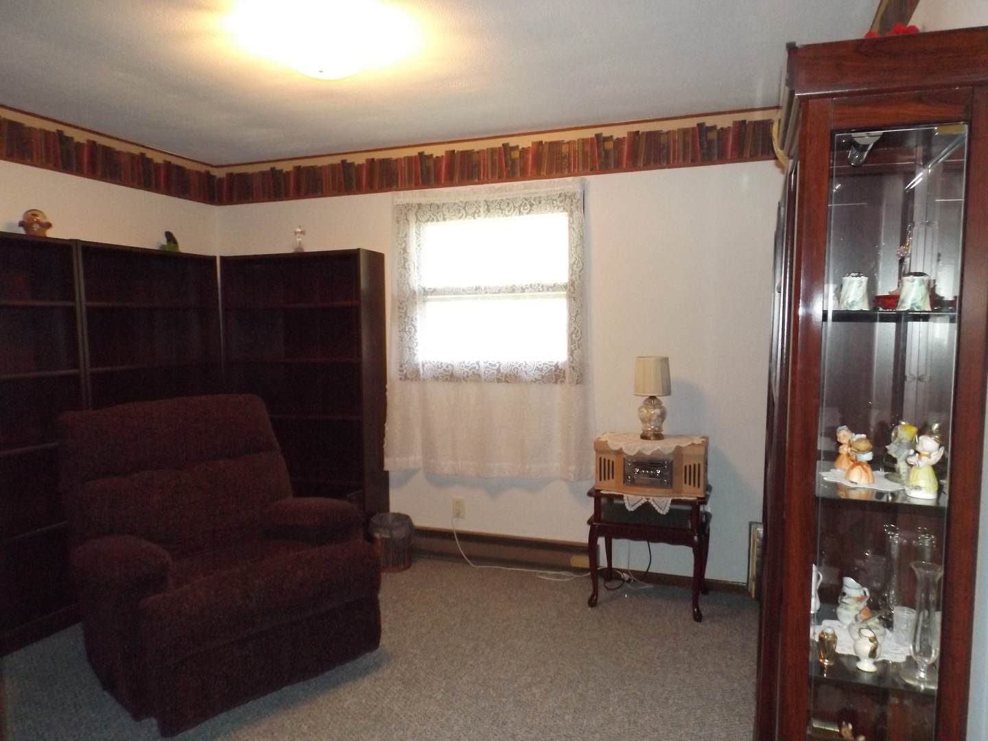 7573 Blue Goose Road Prophetstown, IL 61277 - Photo 16 of 24 a living room with furniture and a window