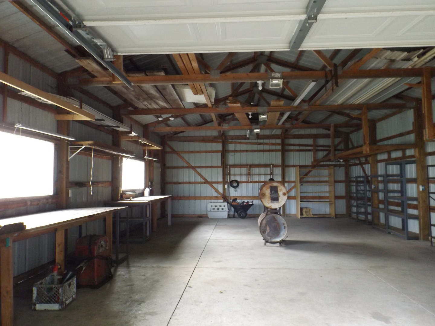 7573 Blue Goose Road Prophetstown, IL 61277 - Photo 24 of 24 a view of a storage room with racks