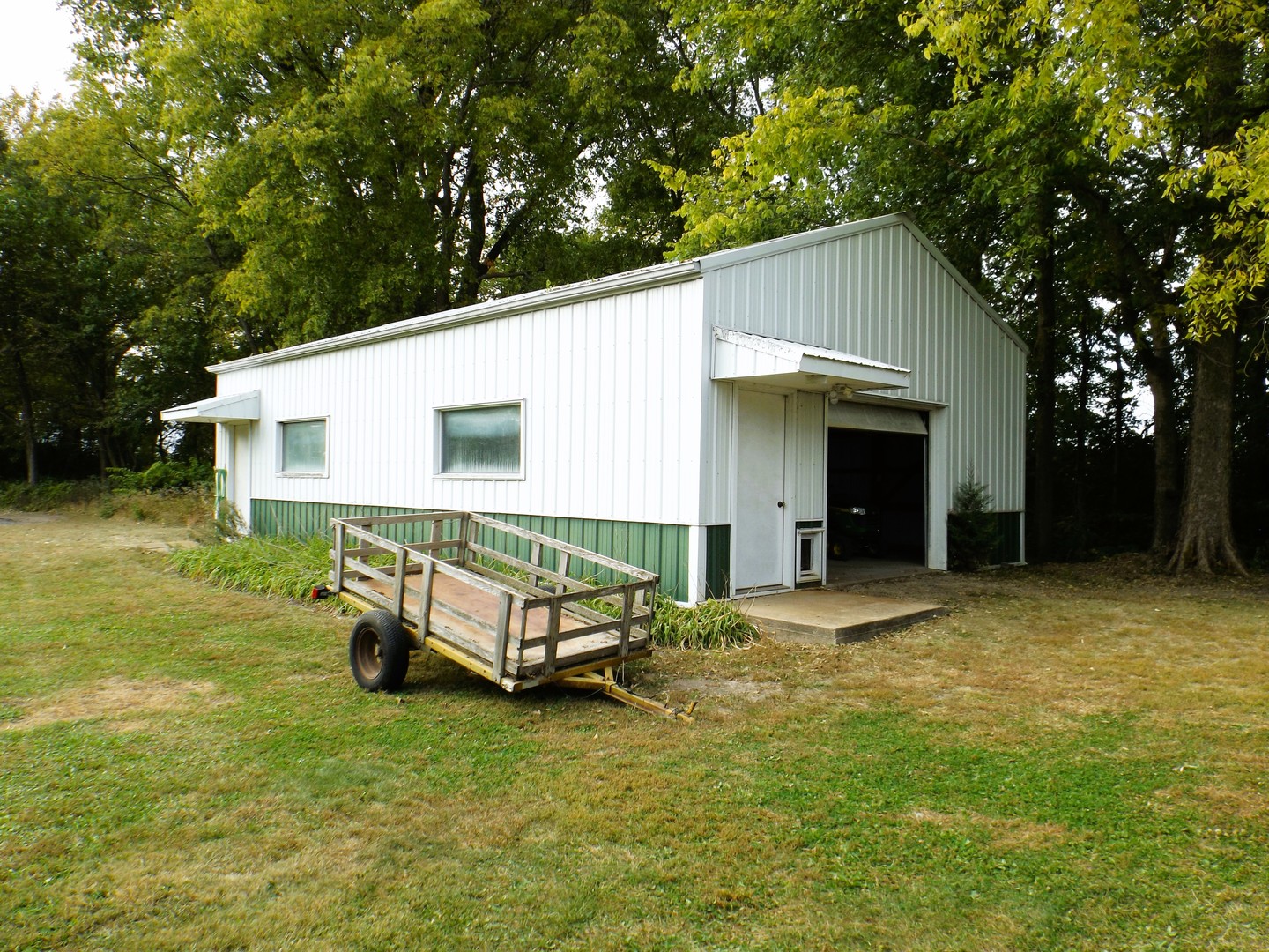 7573 Blue Goose Road Prophetstown, IL 61277 - Photo 5 of 24 a backyard of a house with table and chairs