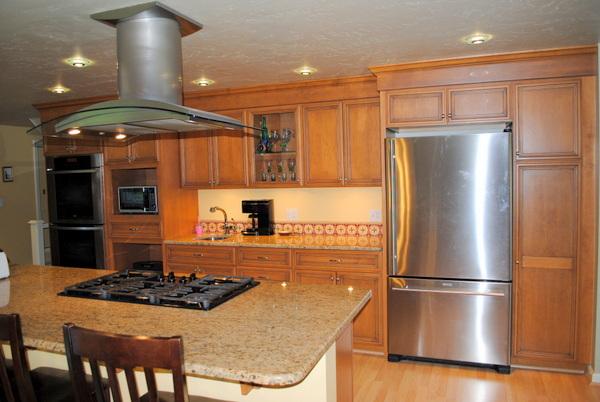 15 Bay View Road Webster, MA 01570 - Photo 4 of 27 a kitchen with a refrigerator and a stove