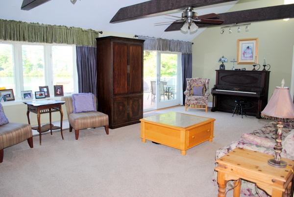 15 Bay View Road Webster, MA 01570 - Photo 7 of 27 a living room with furniture and a pool table