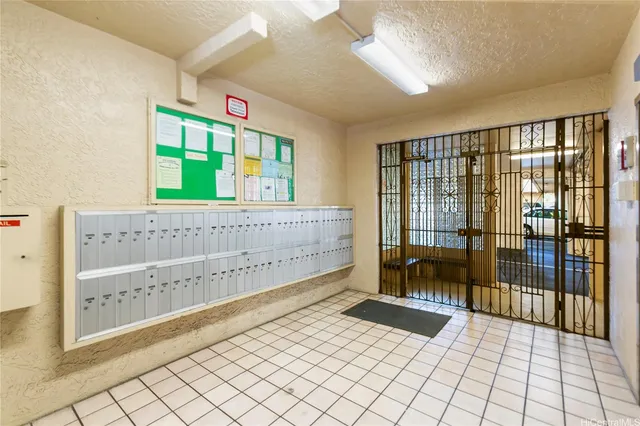 a view of an entryway with a floor to ceiling window