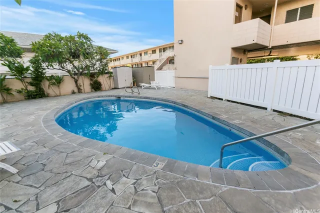 a view of outdoor space and swimming pool