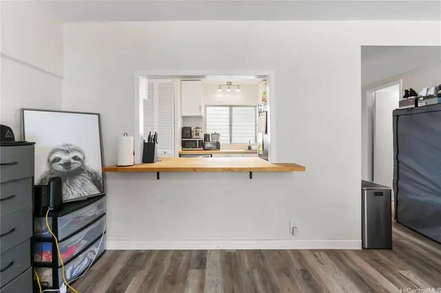 a bathroom with a sink a mirror and shower