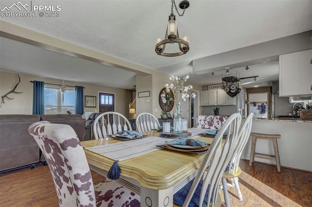 21750 Scott Road Calhan, CO 80808 - Photo 18 of 50 a view of a dining room with furniture