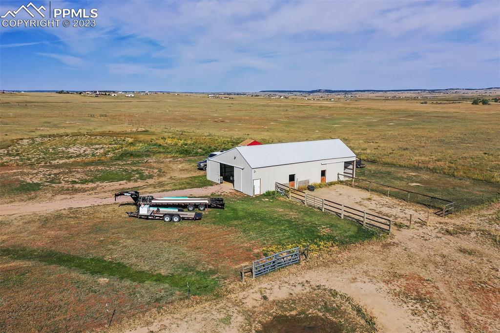 21750 Scott Road Calhan, CO 80808 - Photo 6 of 50 an aerial view of a house with a ocean view
