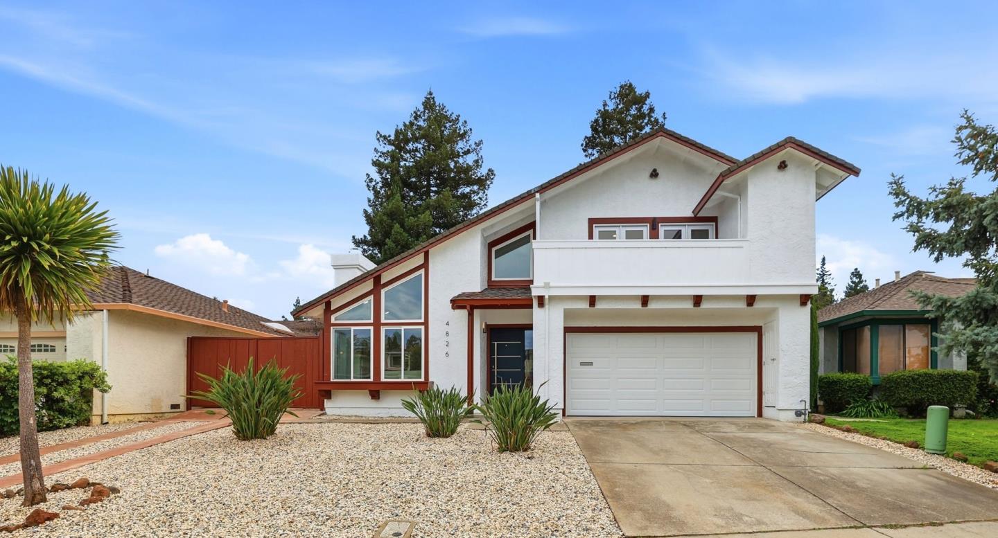 4826 Rio Vista Avenue San Jose, CA 95129 - Photo 1 of 1 a view of a house with a yard and potted plants