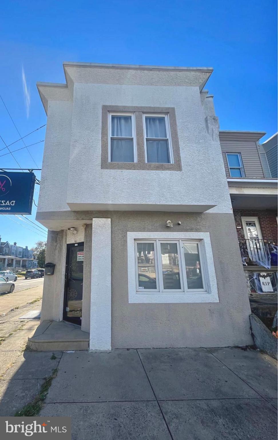 4084 Higbee Street Philadelphia, PA 19135 - Photo 2 of 12 a front view of a house with a yard