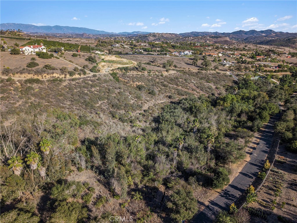 0 Vía Puerta Del Sol Bonsall, CA 92003 - Photo 20 of 25 an aerial view of residential houses with outdoor space